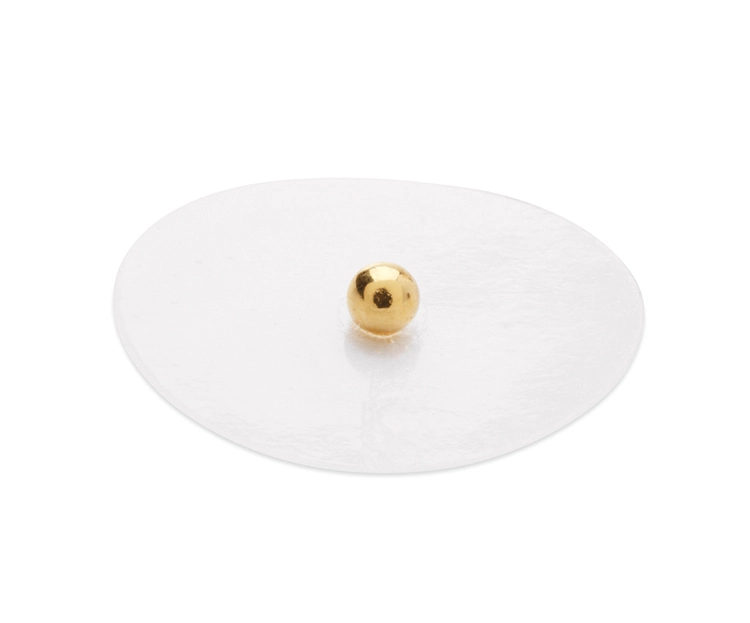 bolitas banadas en oro con adhesivo transparente